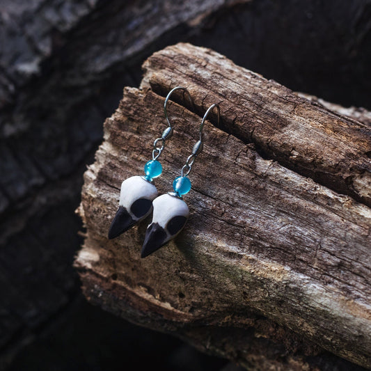 Bird Skull Earrings with light blue beads – handmade mystical jewelry Riga